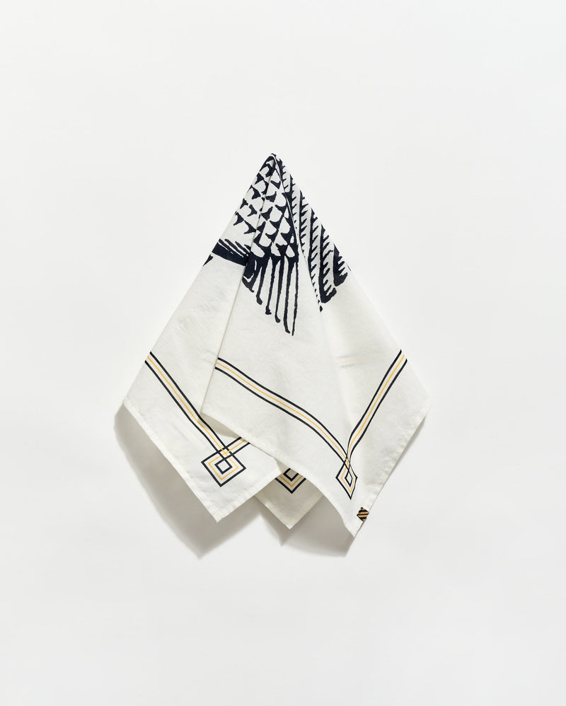 White napkin with black geometric pattern on a white background Alternate