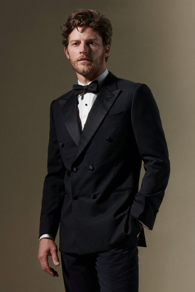 model wears tuxedo