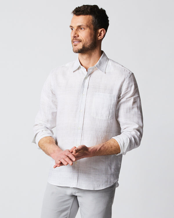 Male model wears the Tuscumbia Shirt in White/Grey plaid