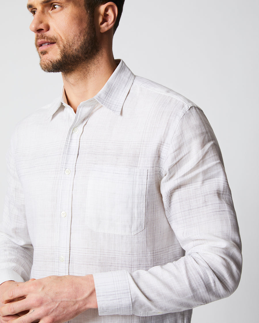 Male model wears the Tuscumbia Shirt in White/Grey plaid