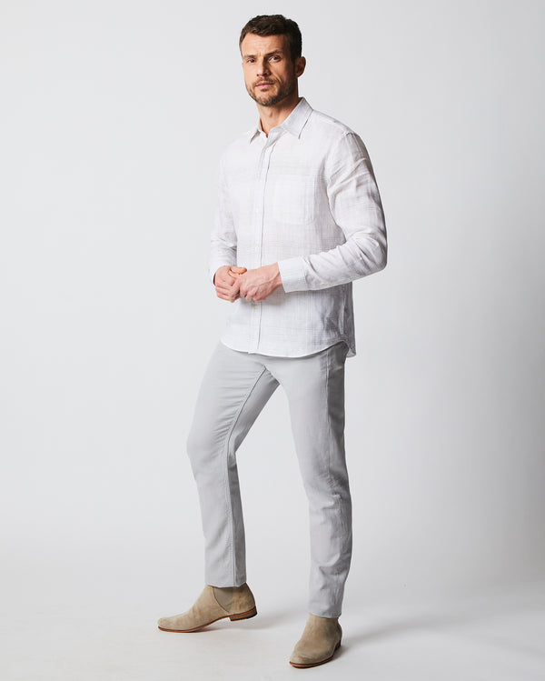 Male model wears the Tuscumbia Shirt in White/Grey plaid