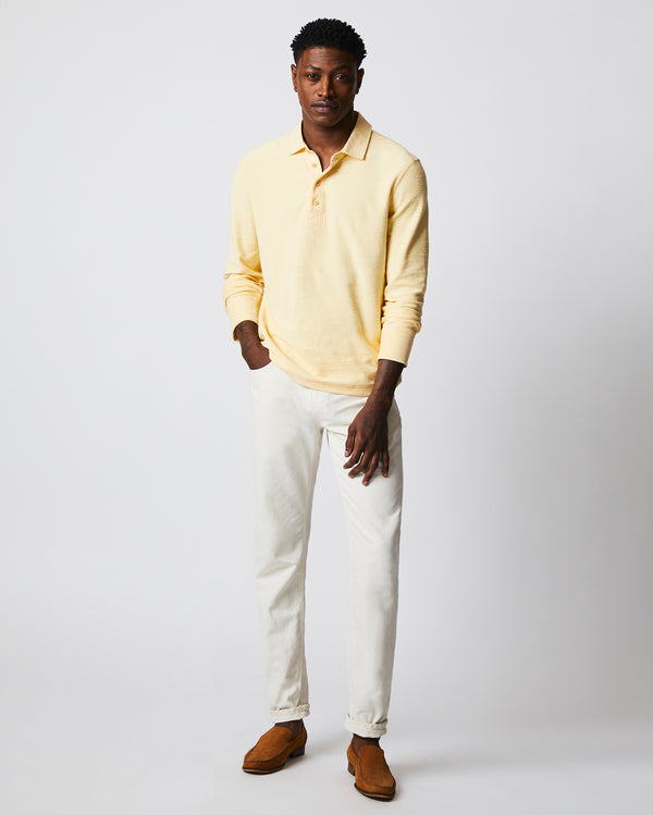 Male model wears the Long Sleeve Terry Rugby Polo in Pale Yellow