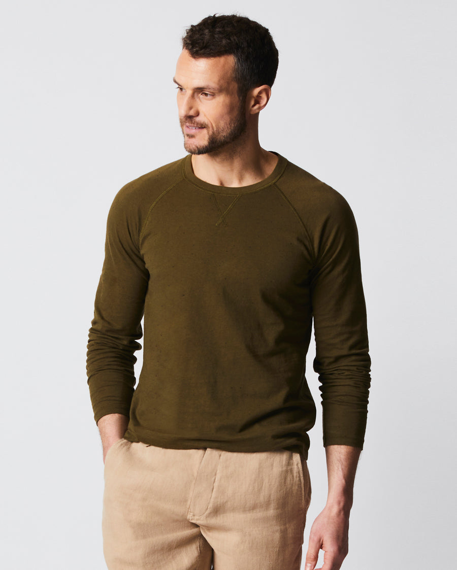 Male model wears the Donegal Crew Neck in Olive