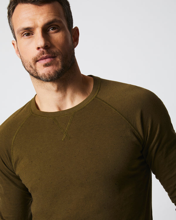 Male model wears the Donegal Crew Neck in Olive