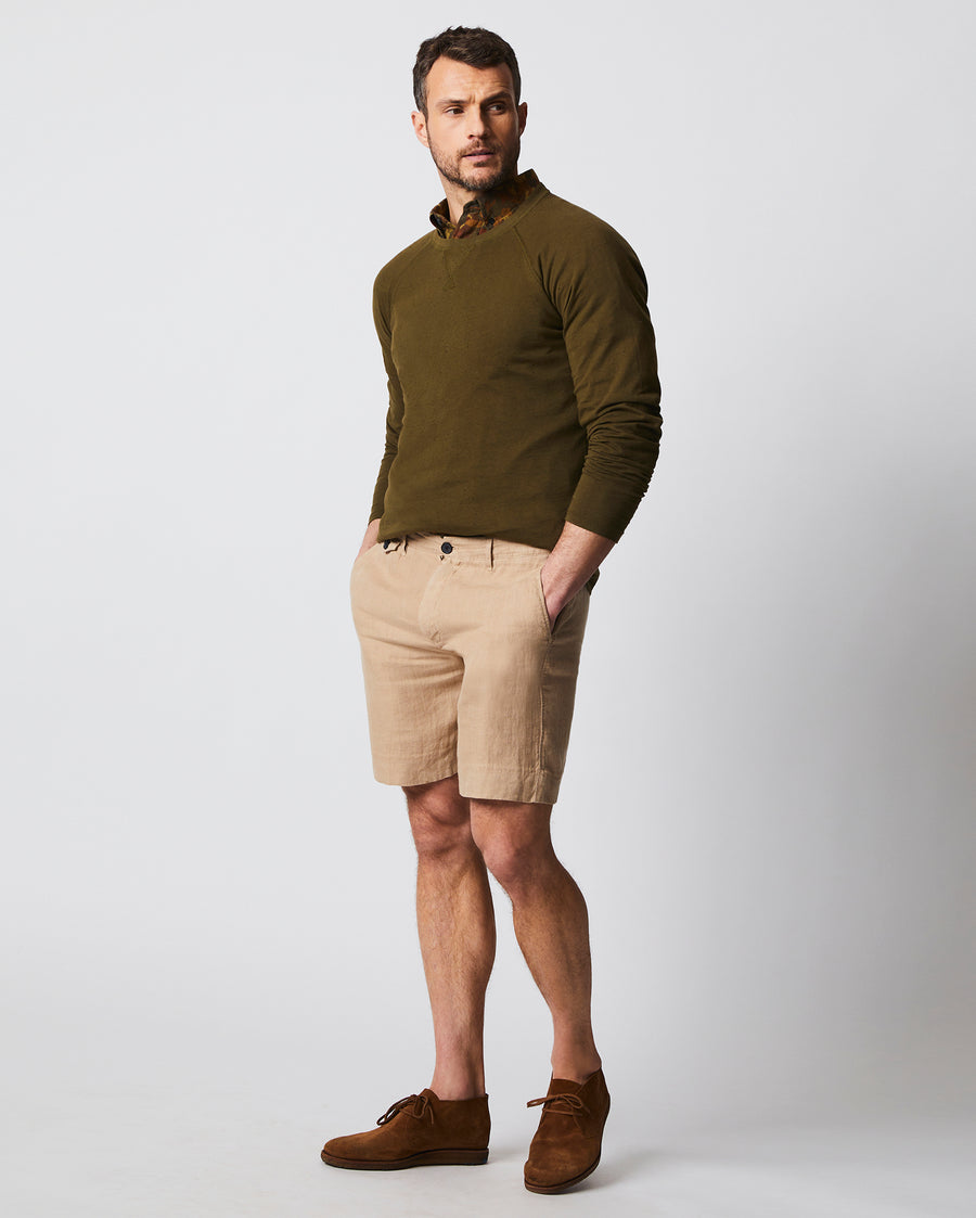 Male model wears the Donegal Crew Neck in Olive
