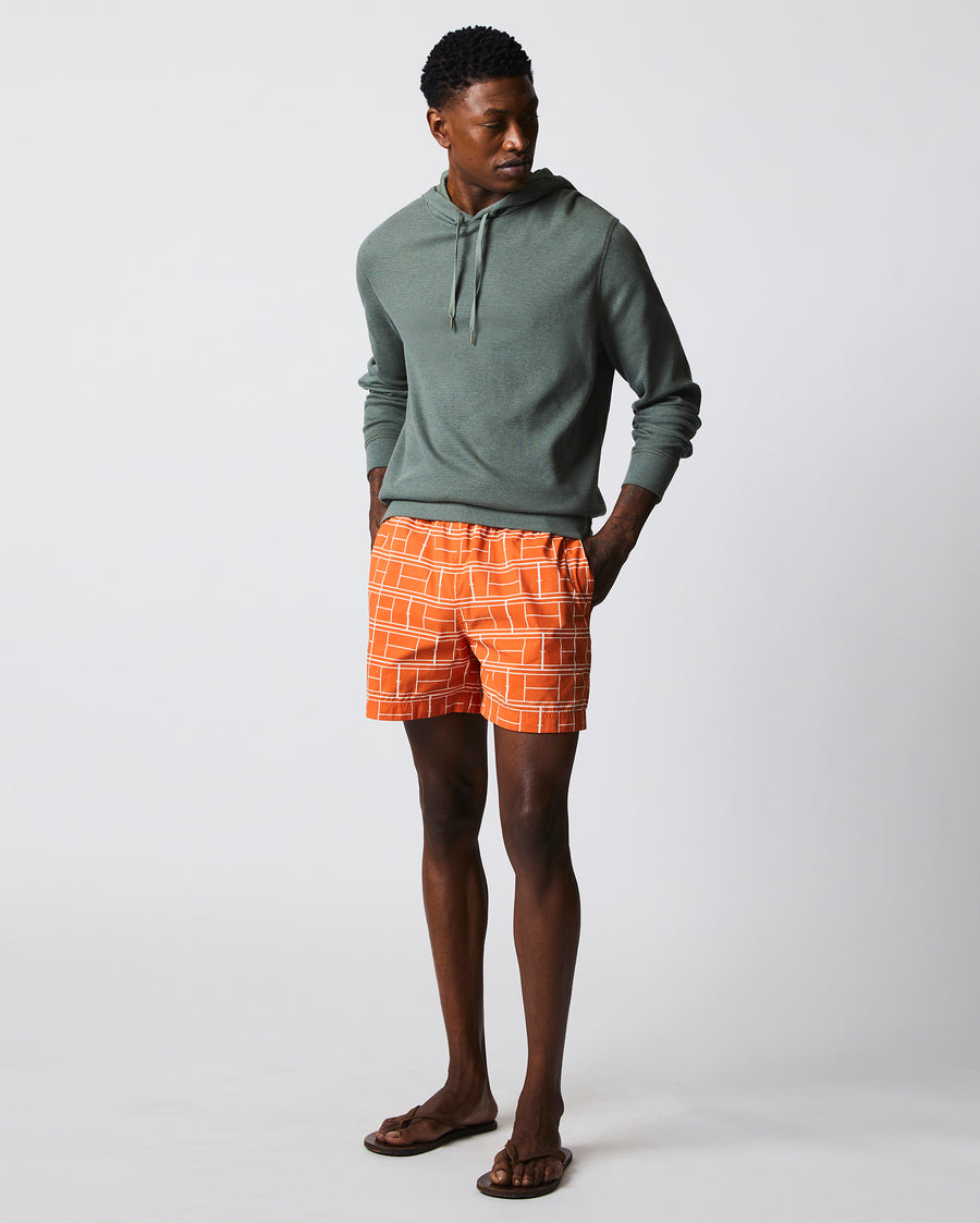 Male model wears the Thermal Hoodie in Slate Green