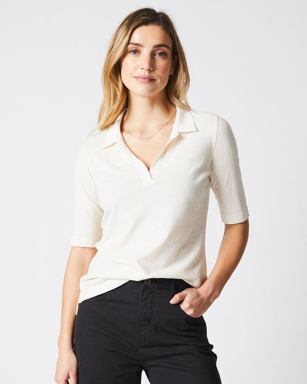 Female model wears the polo knit in White