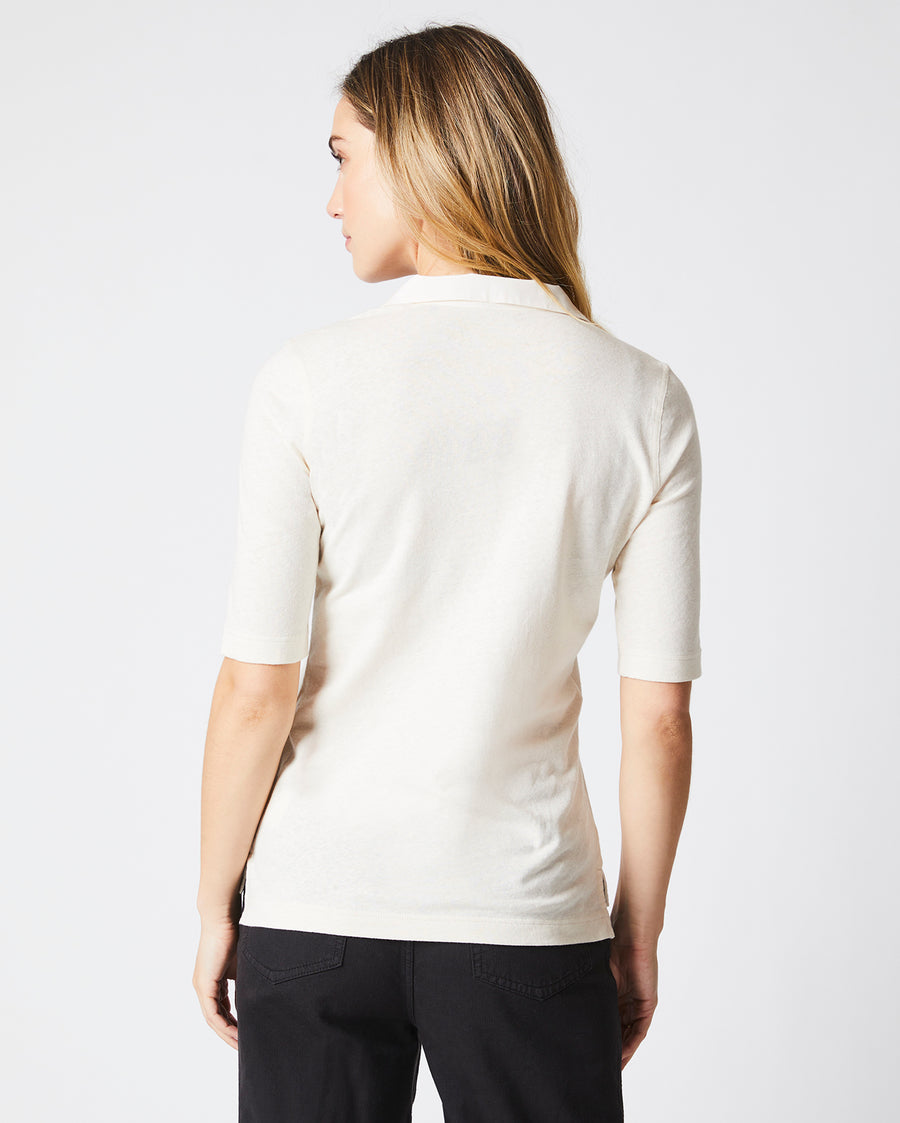 Female model wears the polo knit in White