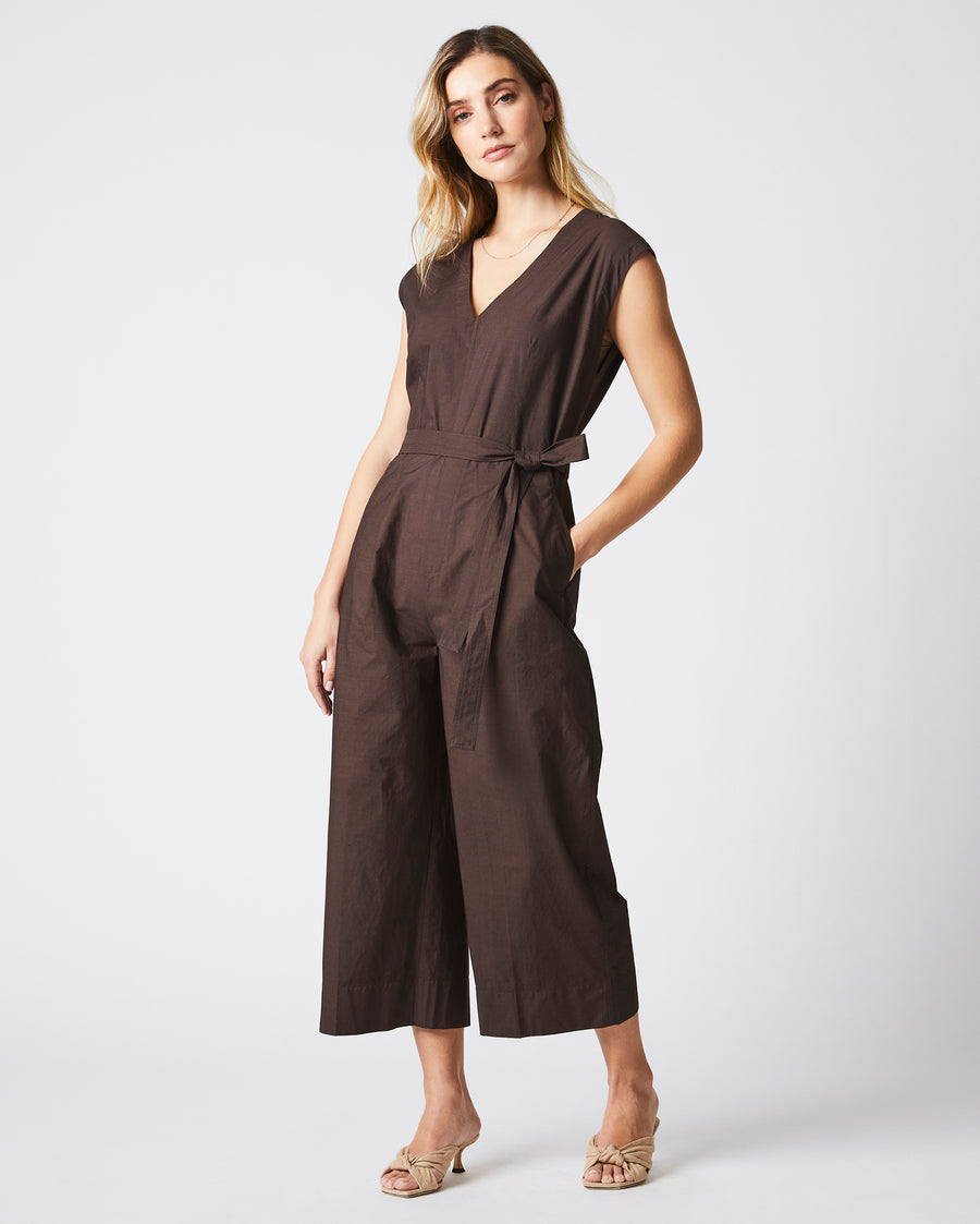 Female model wears the Jumpsuit in Chocolate