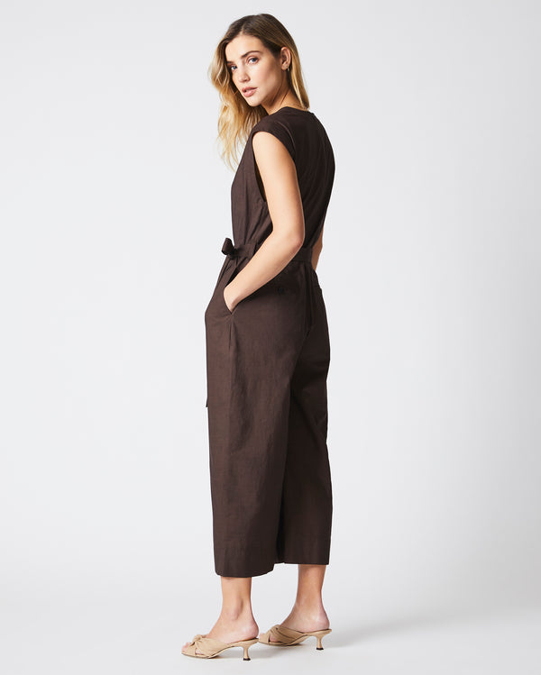Female model wears the Jumpsuit in Chocolate