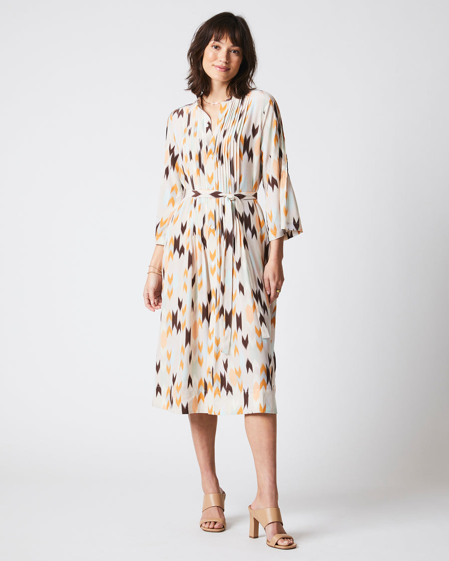 Female Model wears the Silk Pleated Shirt Dress Print