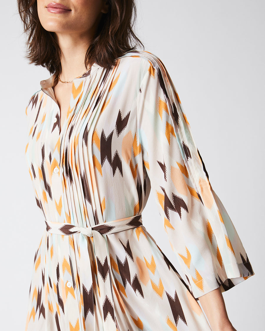 Female Model wears the Silk Pleated Shirt Dress Print