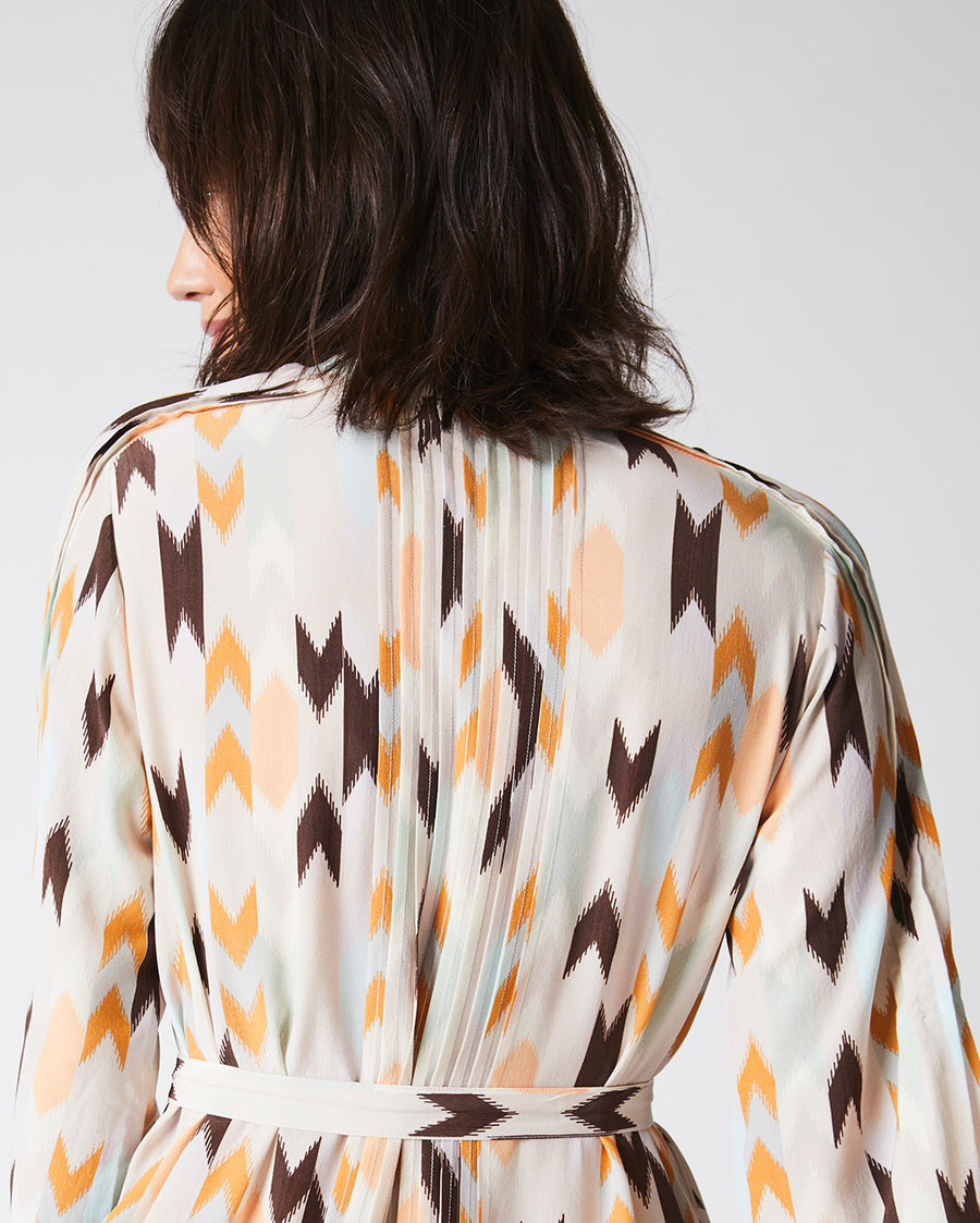 Female Model wears the Silk Pleated Shirt Dress Print