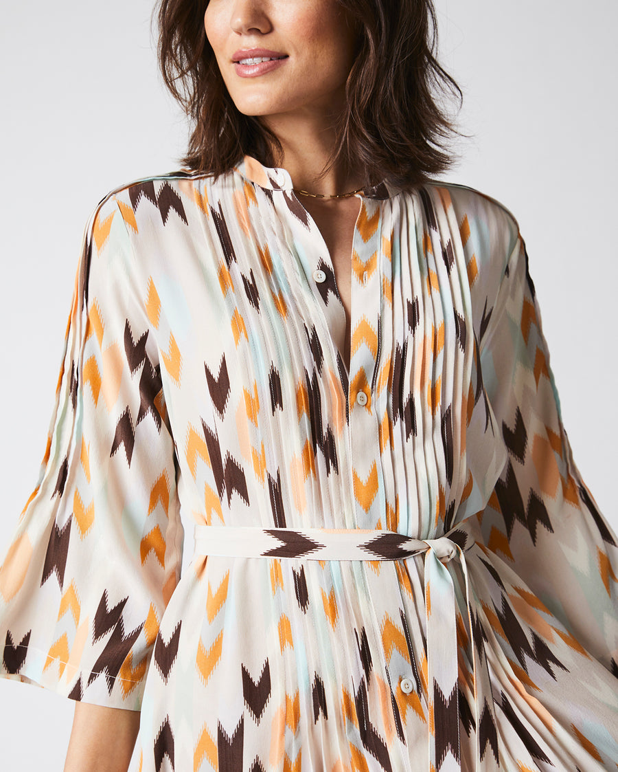 Female Model wears the Silk Pleated Shirt Dress Print