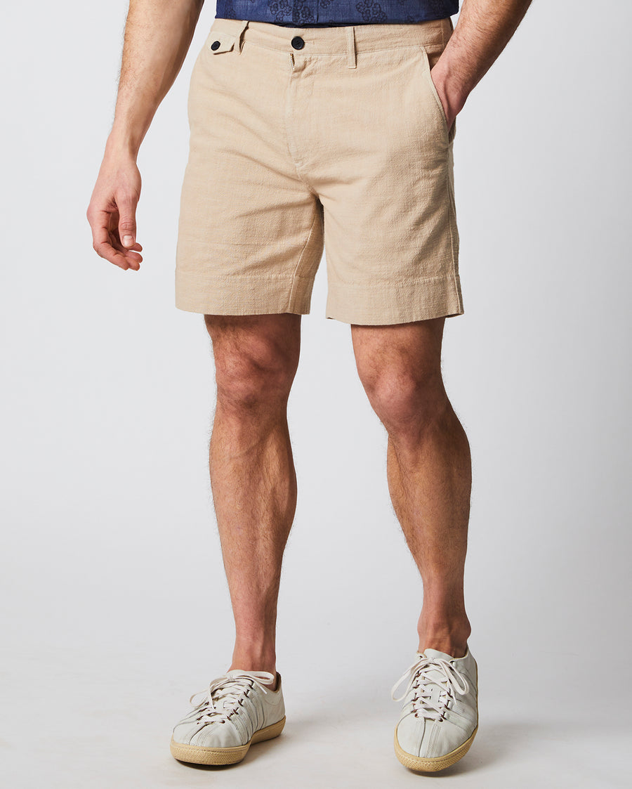 Male model wears the slub cotton short in khaki