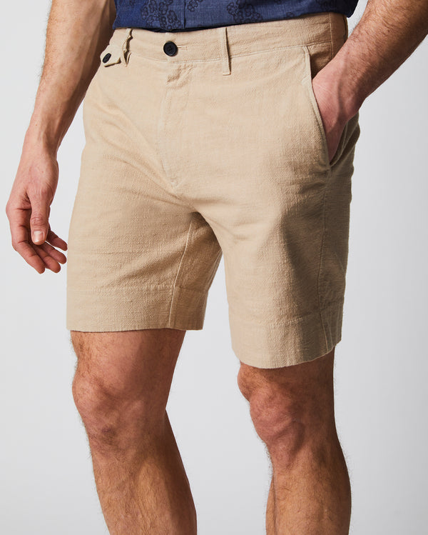 Male model wears the slub cotton short in khaki